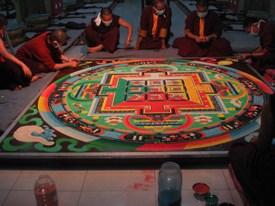 monks creating a sand mandala