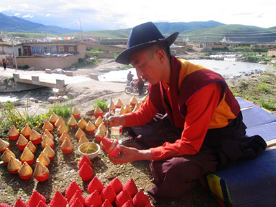 tibetan artisan painting tormas